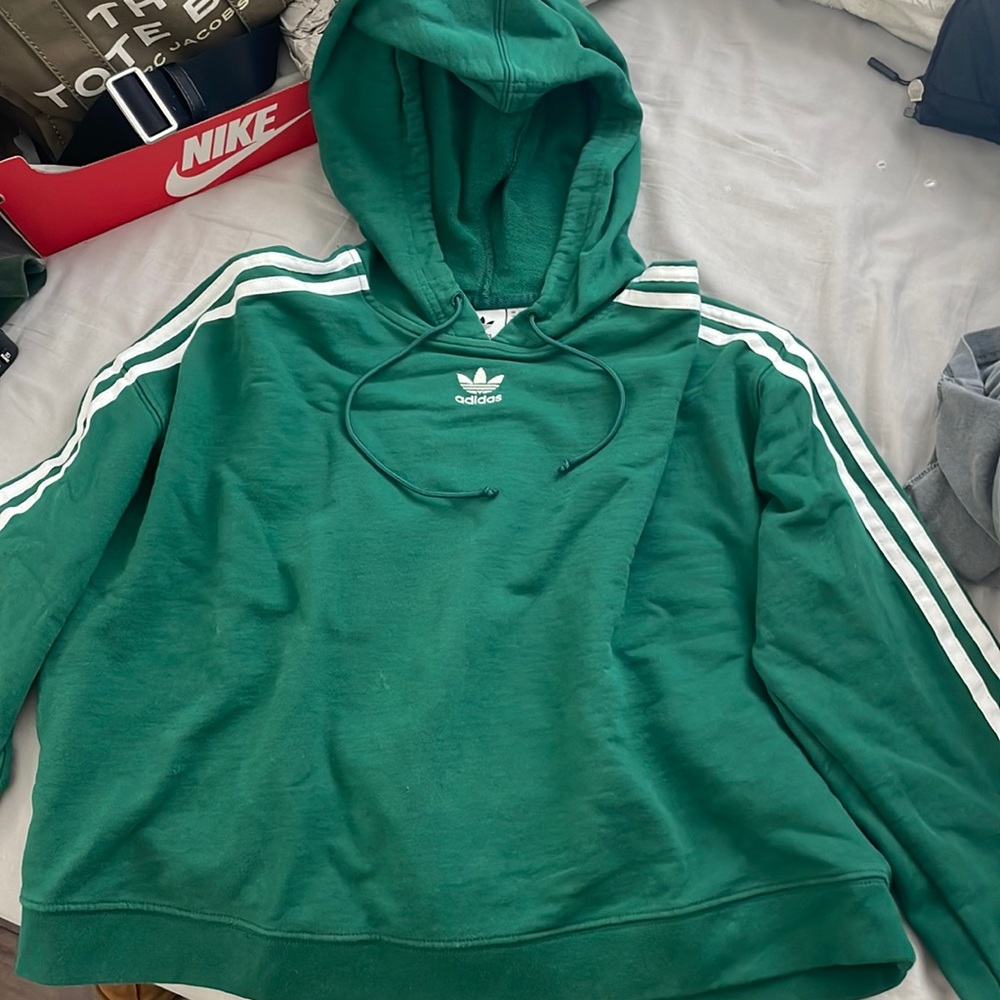 green adidas cropped hoodie.